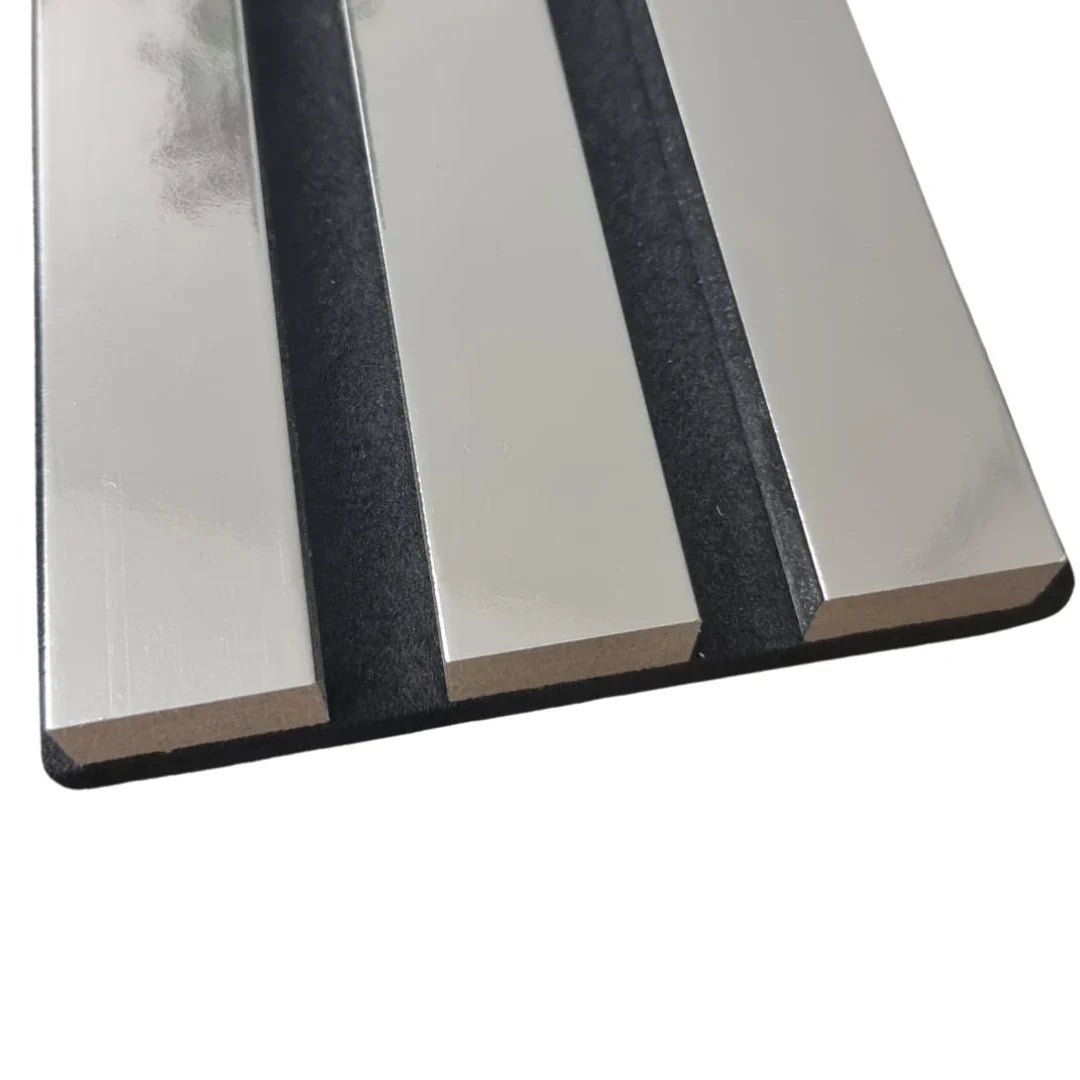 Three silver slatted panels on a dark gray felt backing.