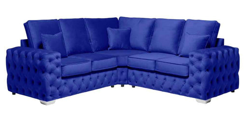 Ashton plush corner sofa in royal blue with deep button detailing.