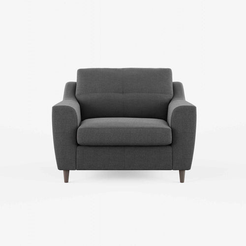 A charcoal fabric armchair with tapered wooden legs.
