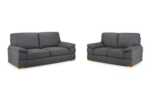 Two grey fabric sofas with wooden legs.