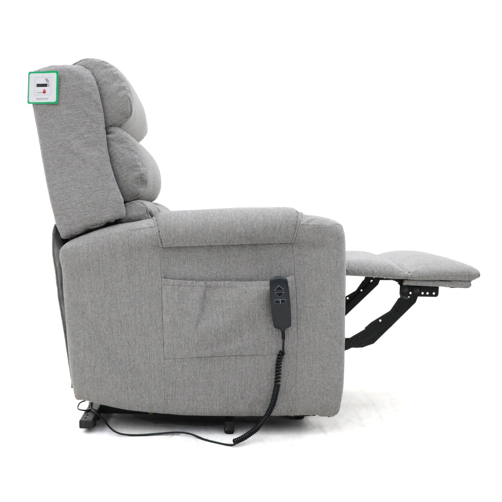 Grey fabric dual motor rise and recline armchair with footrest extended.