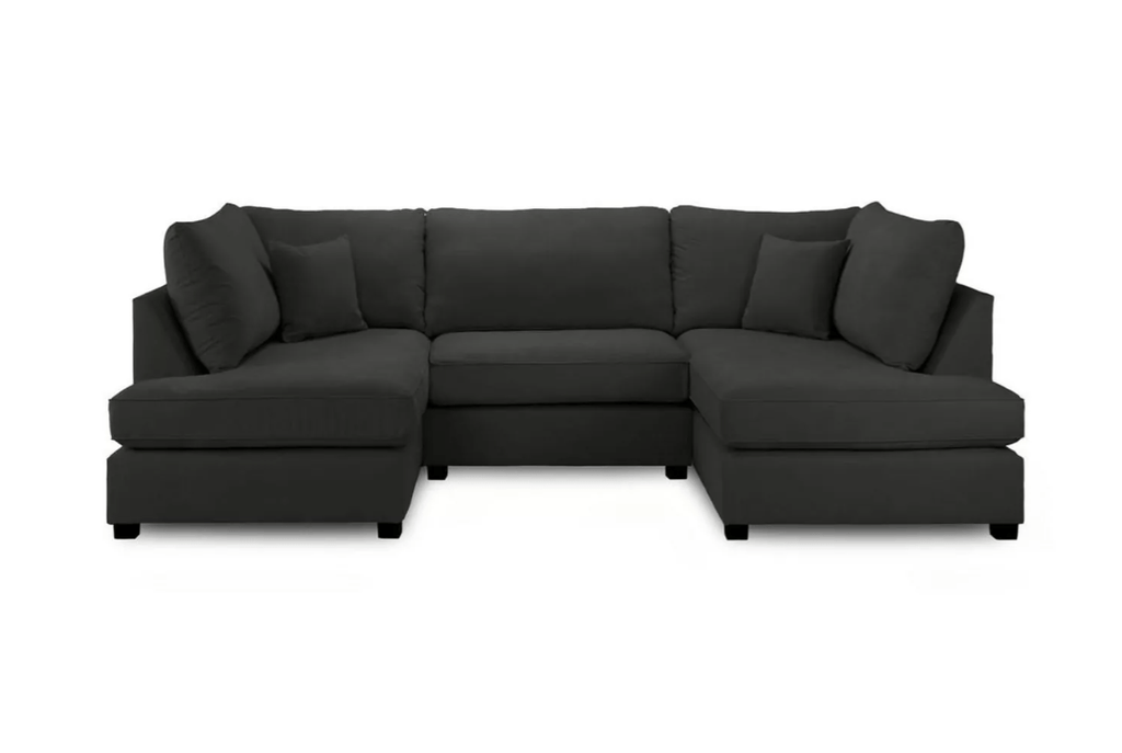 U-shaped dark gray fabric sofa with plush cushions.