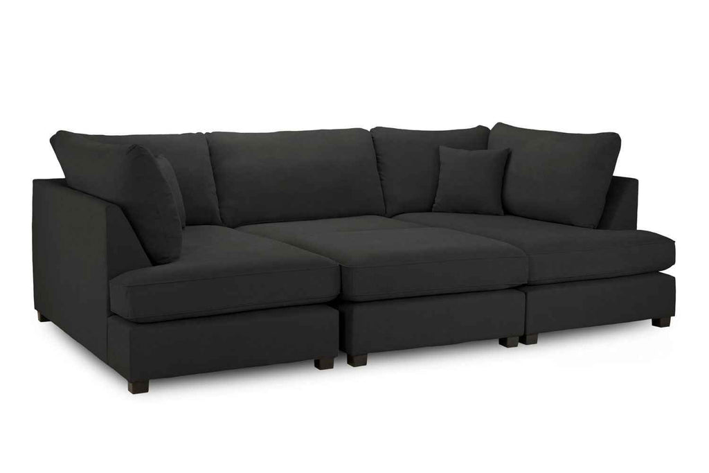 U shaped black fabric corner sofa with plush cushions.