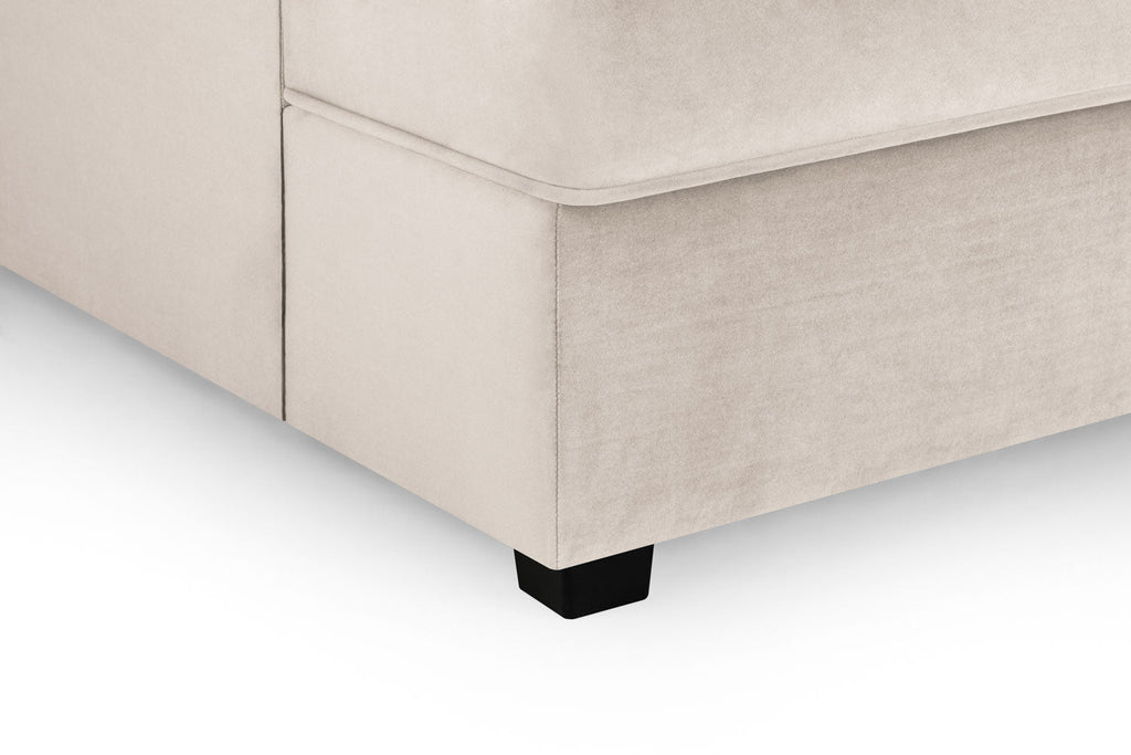 Carnabie U Shaped Plush Velvet Corner Sofa with black feet.