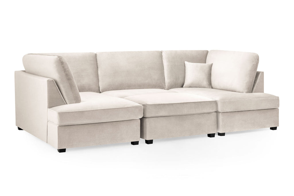Carnabie U shaped plush velvet corner sofa in cream.