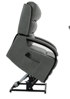 Coniston leather rise and recline chair in grey, shown from the side.