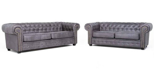 Arnside Suede Chesterfield sofa collection in grey with button detailing.