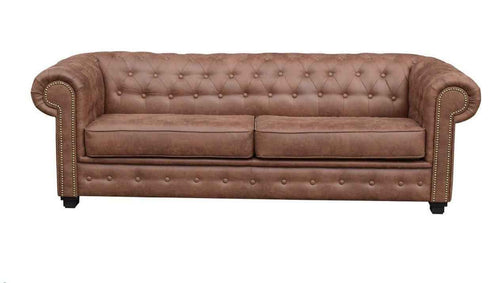 Brown faux suede Chesterfield sofa with button tufting and nailhead trim.