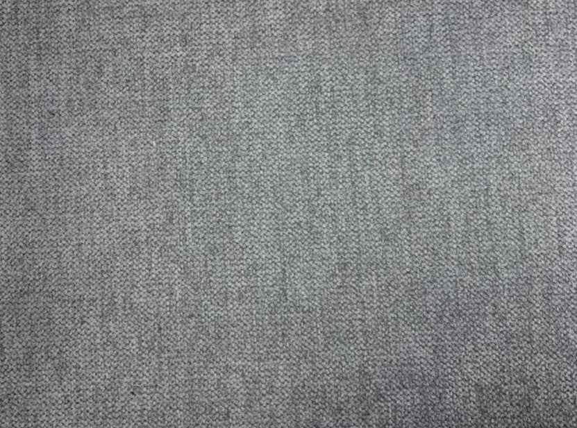 Grey fabric texture of a U-shaped sofa.