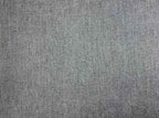 Grey fabric texture of a U-shaped sofa.