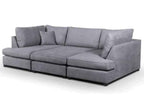 U shaped grey fabric corner sofa with plush cushions.