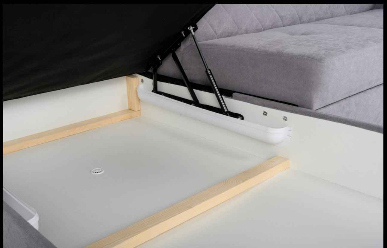 Hilton storage corner sofa bed with headrests, showing the open storage compartment.