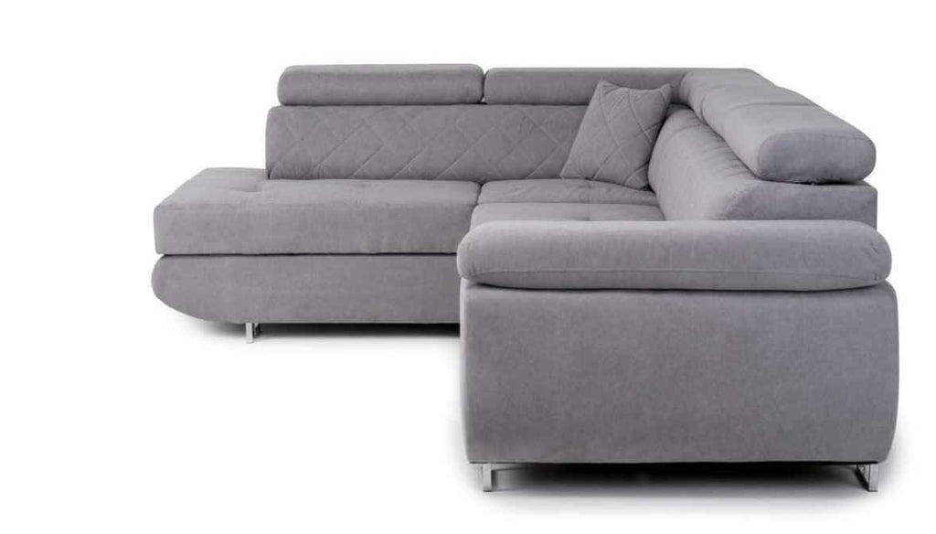 Grey fabric corner sofa bed with adjustable headrests and a decorative pillow.