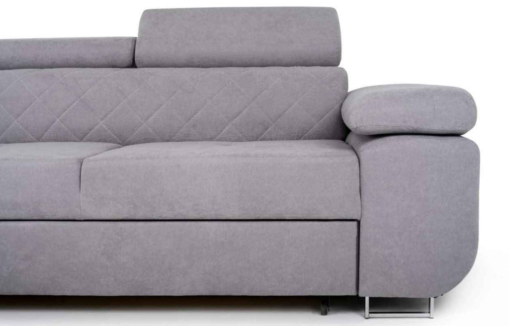 Grey fabric corner sofa bed with adjustable headrests and storage.