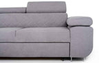 Grey fabric corner sofa bed with adjustable headrests and storage.