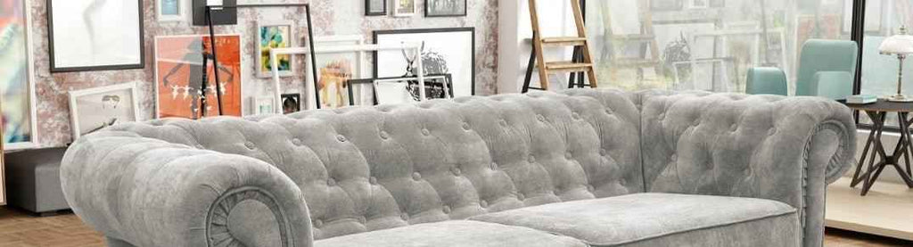 Ireby Chesterfield sofa bed in fabric, tufted grey upholstery.