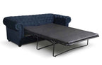Navy blue fabric Chesterfield sofa bed with a pull-out mattress.