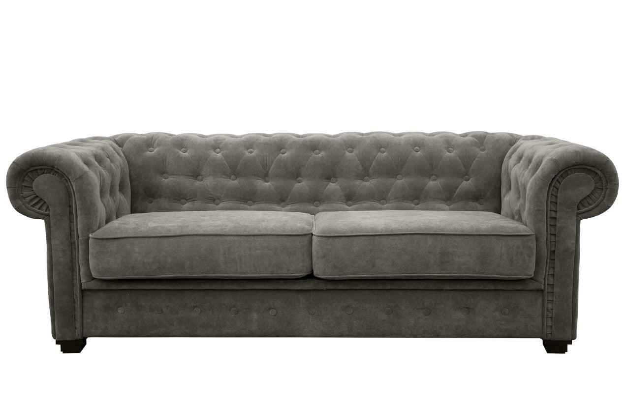 Grey fabric Chesterfield sofa bed with tufted back and rolled arms.