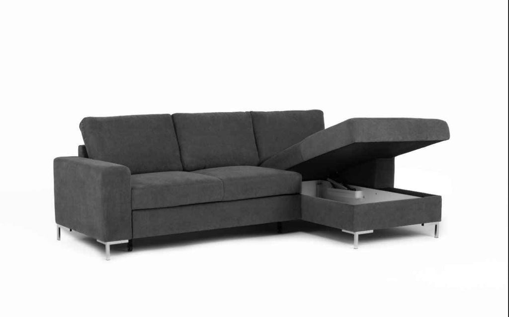 Dark gray corner sofa bed with open storage compartment.
