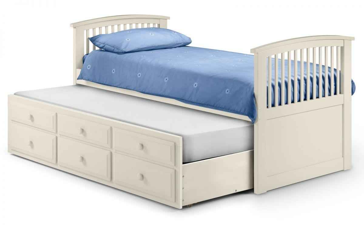 A cream wooden bed frame with a pull-out underbed and three drawers.