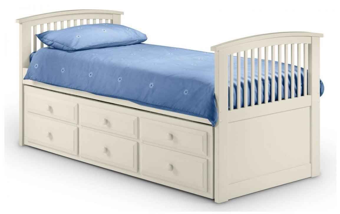 A white wooden bed frame with a blue comforter and six drawers.