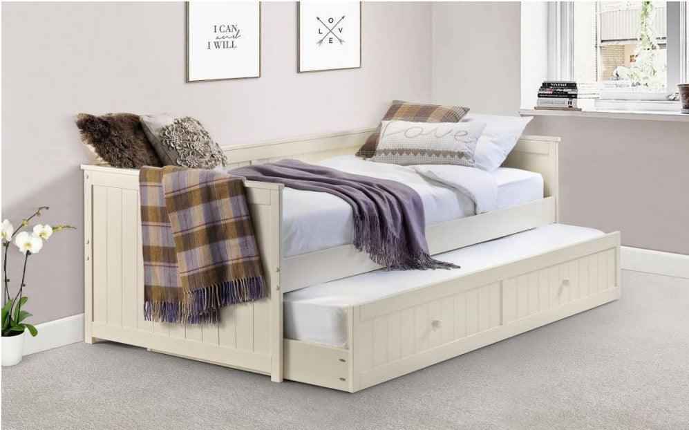 Jessica daybed and underbed in stone white with fluted panel detailing.