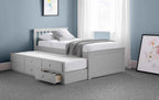 Grey wooden captain's bed with a pull-out trundle and six storage drawers.