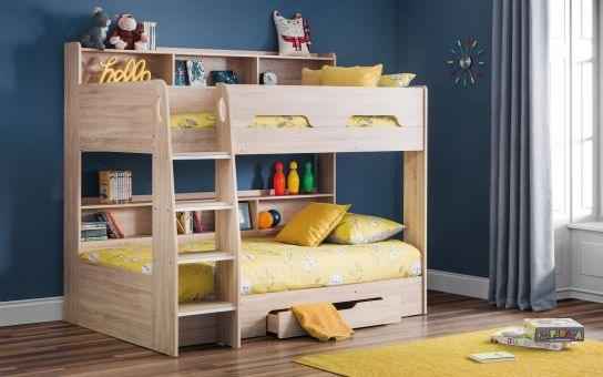 The Orion wooden bunk bed in a light wood finish with yellow bedding.