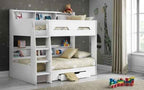 A white wooden bunk bed with shelves and a pull-out drawer.